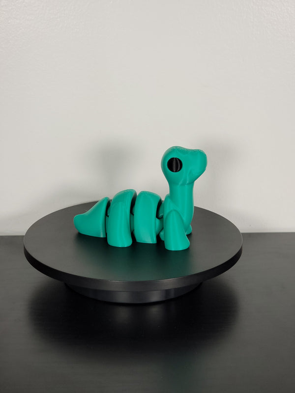 3D Printed Interlinked Dinosaur Figurine